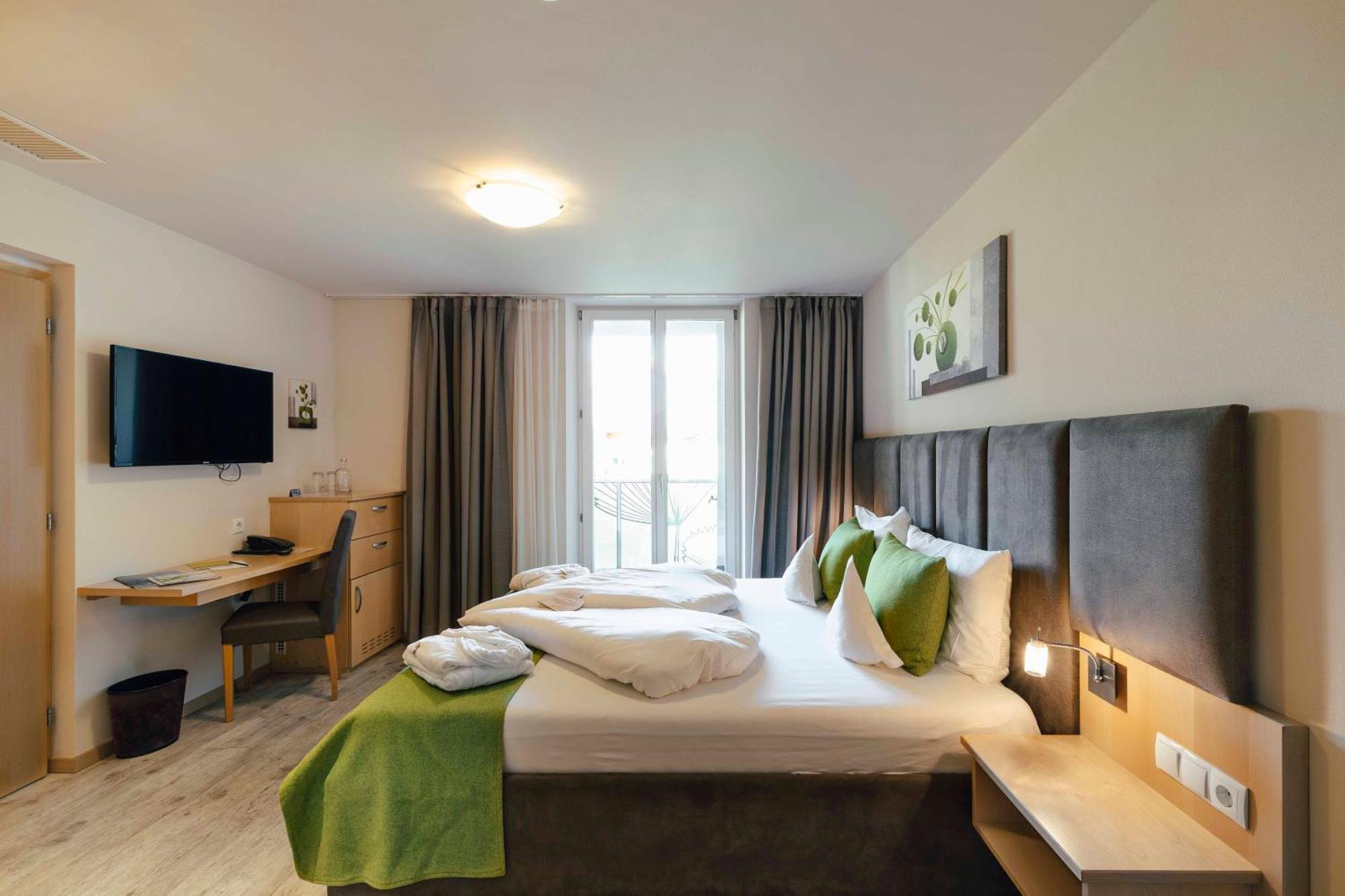 Hotel Pfeiss Lana Quarto foto